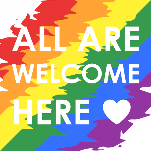 Ferienhaus Kellerwald Bunte Regenbogenflagge mit Text 'ALL ARE WELCOME HERE' für Inklusion und Vielfalt Ferienhaus Edersee, Zeichen für gelebte Vielfalt, ALL ARE WELCOME HERE
