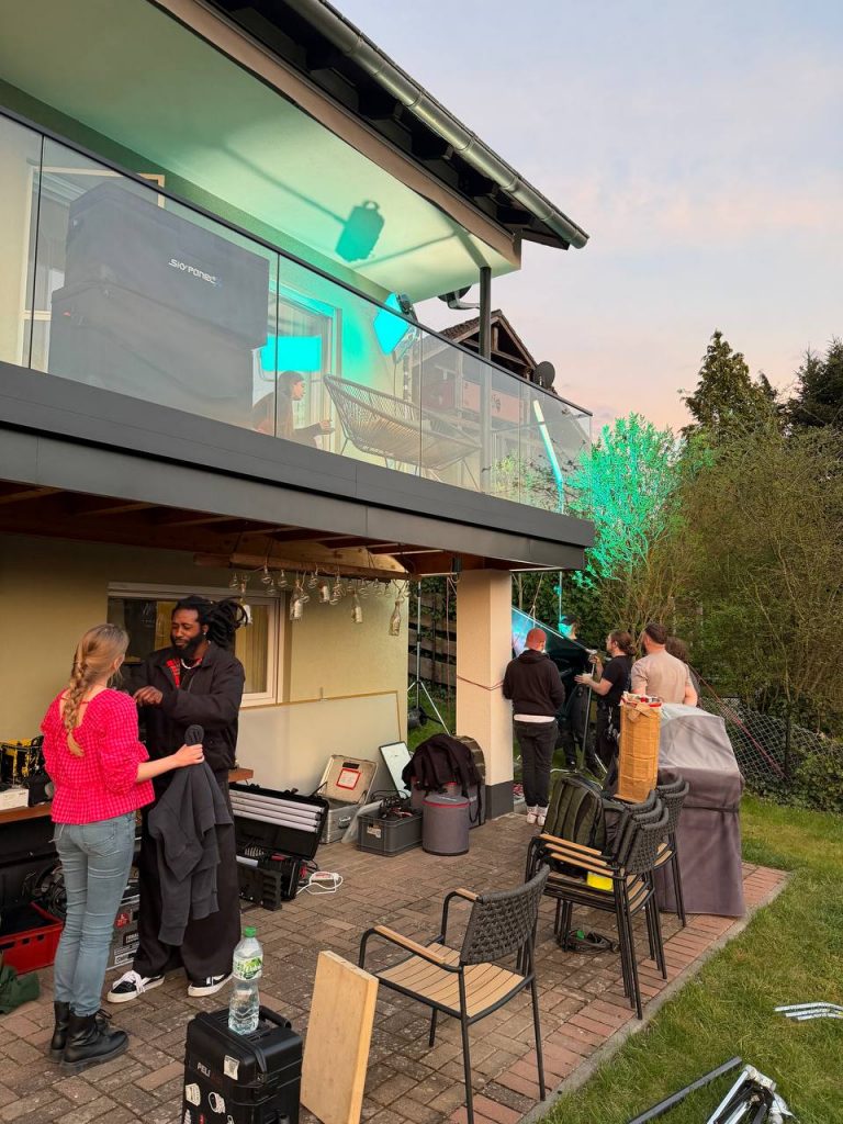 Film crew during filming in the modern house garden, Edersee vacation home, Kellerwald vacation home