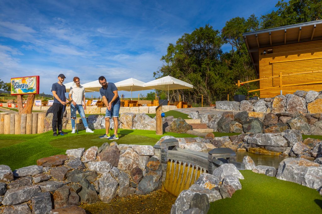 Amusement park mini-golf course with visitors on a sunny day, vacation home Edersee, vacation home Kellerwald